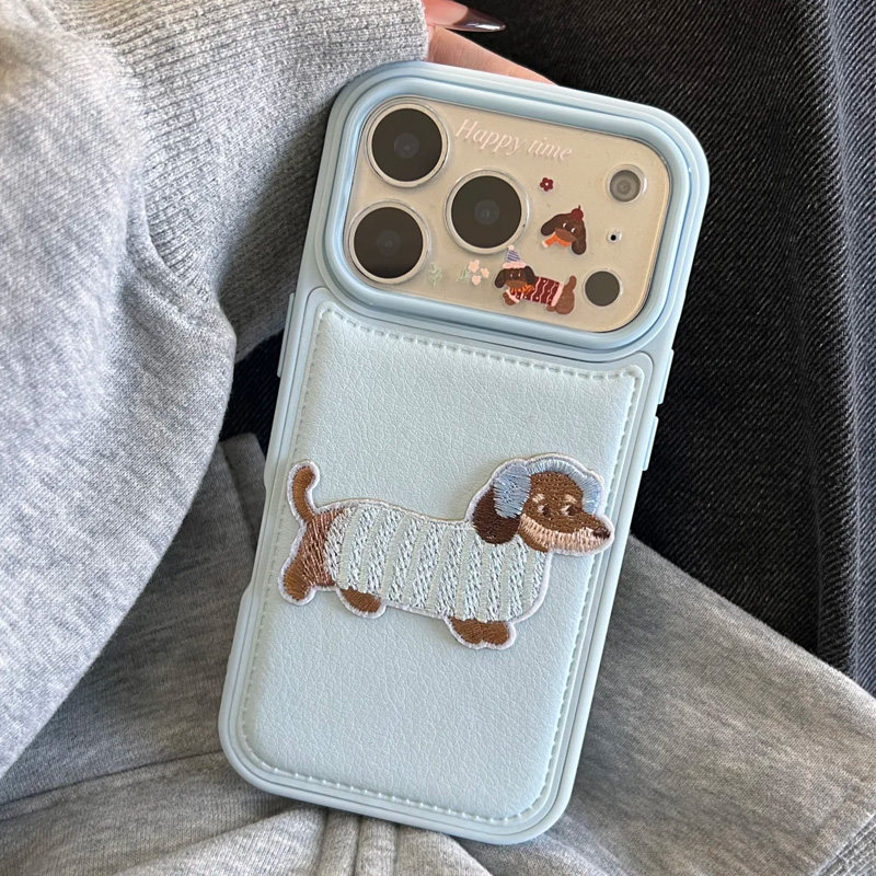 刺绣音乐狗公仔适用于iPhone17promax手机壳苹果17air新款全包大孔皮纹气囊14可爱标签16pro防摔保护套15plus