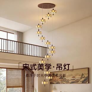 新中式吊灯楼梯灯2025新款设计师公寓别墅复式楼梯间旋转长吊灯具