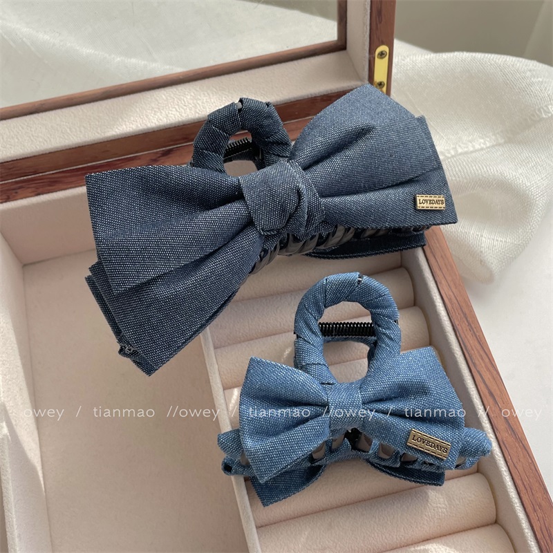 复古气质牛仔结大号抓夹女