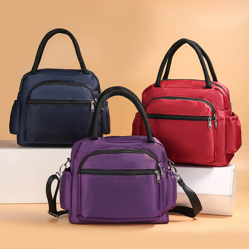 妈咪七格防水手提斜挎帆布包