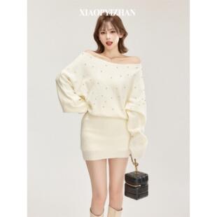 白色一字肩长袖连衣裙女秋冬装法式高级感烫钻针织包臀显瘦短裙子