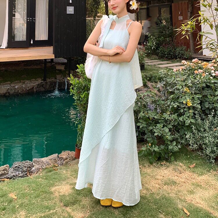 法式气质无袖挂脖吊带连衣裙子女夏季2026新款海边度假不规则长裙