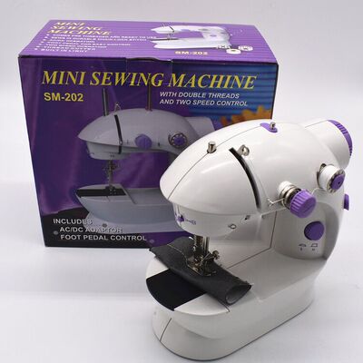 TV电动缝纫机mn sewng machne四合一家用迷你缝纫机