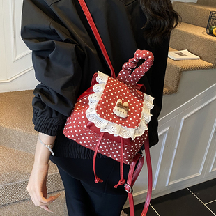 网红波点迷你双肩包女2025新款百搭轻便旅行背包小型通勤包手拎包