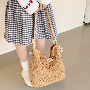 韩国度假风草编包包女2025新款潮时尚文艺编织包百搭斜挎沙滩包