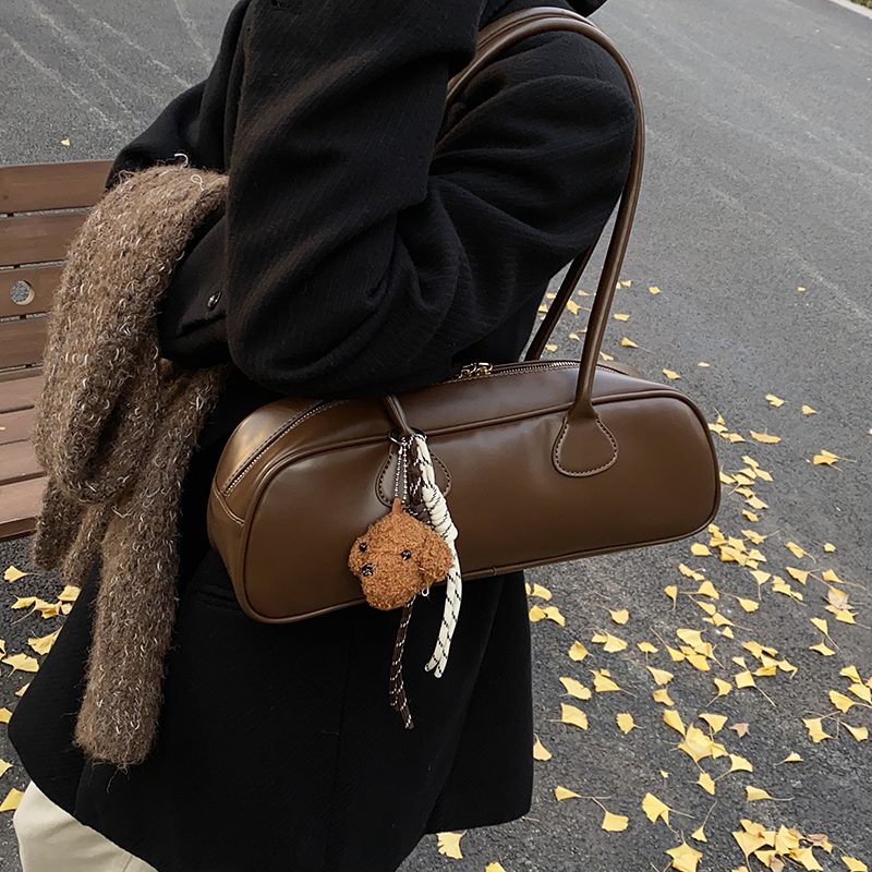 简约休闲法棍包保龄球包包