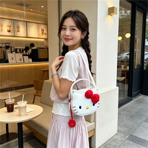 可爱卡通蝴蝶结手提斜挎女包