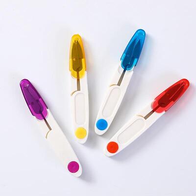 Candy-colored covered scissors with rebound U-shaped design,