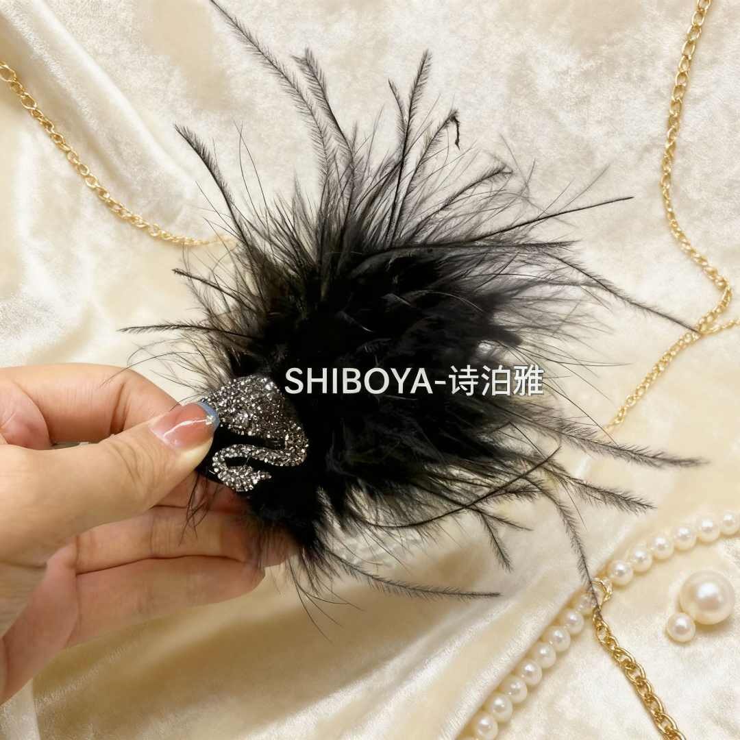萤百妃饰品诗泊雅新款毛茸茸小天鹅羽毛抓夹丸子头丸子头头饰女士
