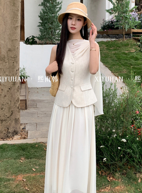 熙雨韩-6年春款极简气质小女人百搭时尚假两件马甲(不含下装)5088