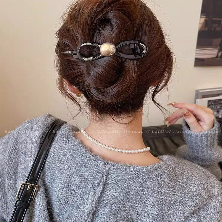 蝴蝶结气质珍珠一字抓夹女