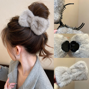 毛绒蝴蝶结丸子头抓夹女后脑勺高级感神器2026新款盘发夹子发饰