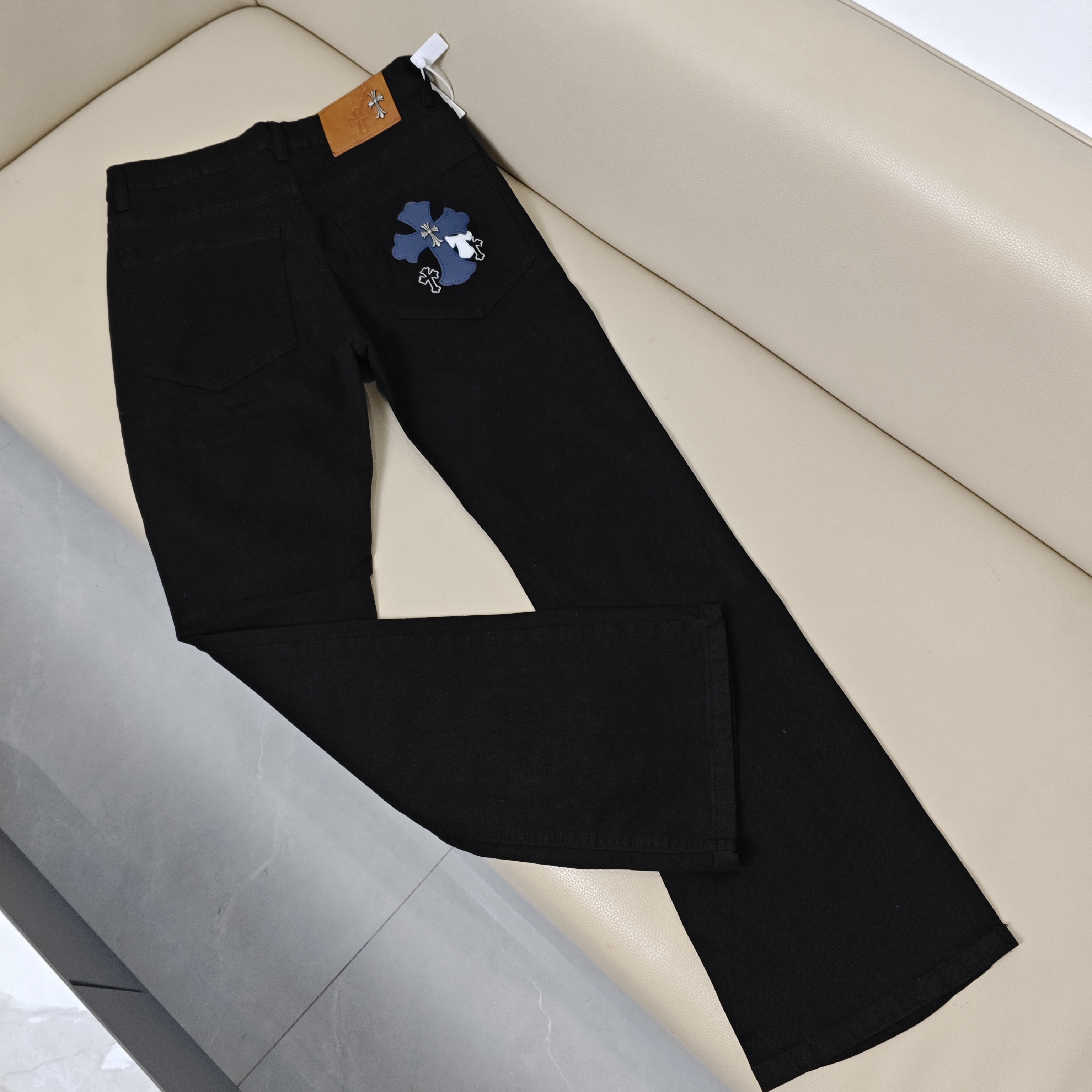 新款潮牌口袋十字架贴皮牛仔裤