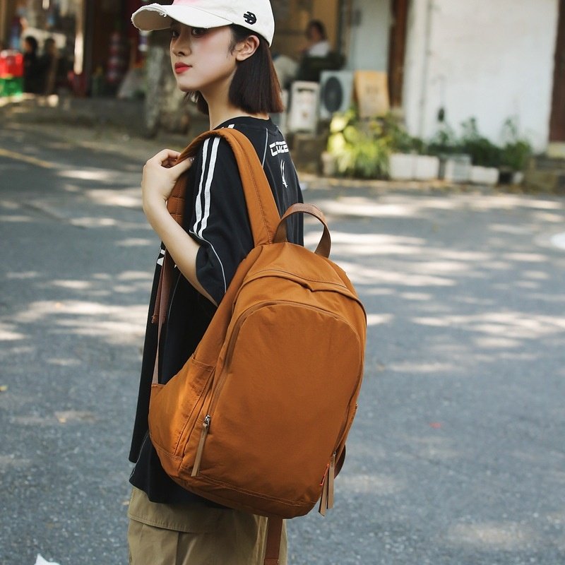 2026新款简约纯色帆布双肩包女韩版初高中大学生书包16寸大容量