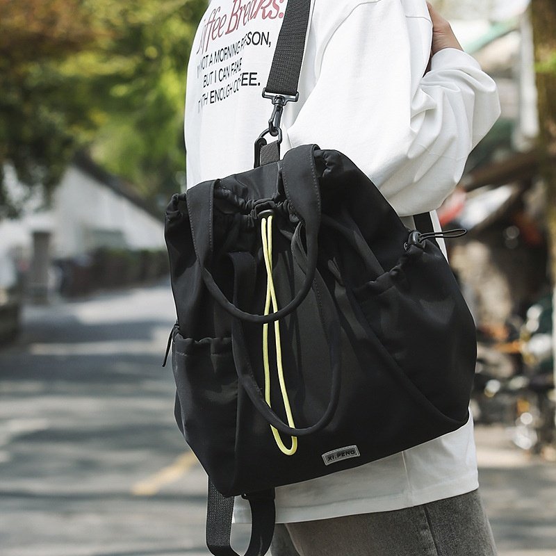 2026新款双肩包女新款抽绳束口袋轻便旅行小背包两用单肩手提包男