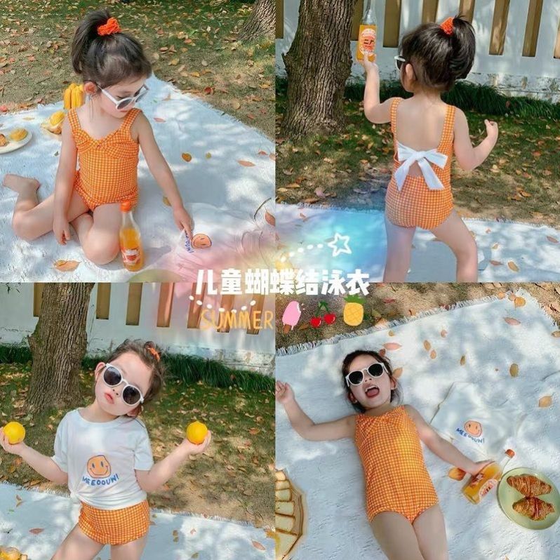 女童蝴蝶结一体式泳衣2023夏季女宝宝可爱格子比基尼连体沙滩泳装