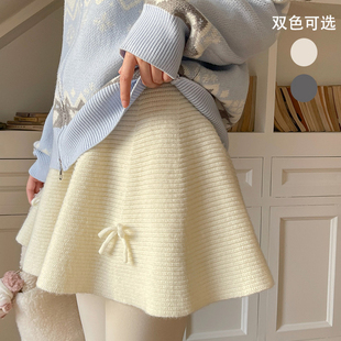 森女部落甜美风百搭纯色A字针织裙新款 冬侧边蝴蝶结高腰半身裙女
