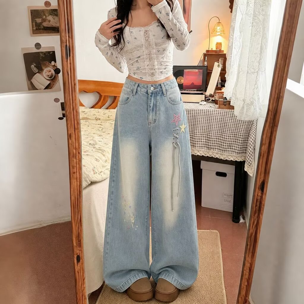 浅蓝色破洞设计感阔腿牛仔裤女2026新款设计感小众宽松显瘦直筒裤