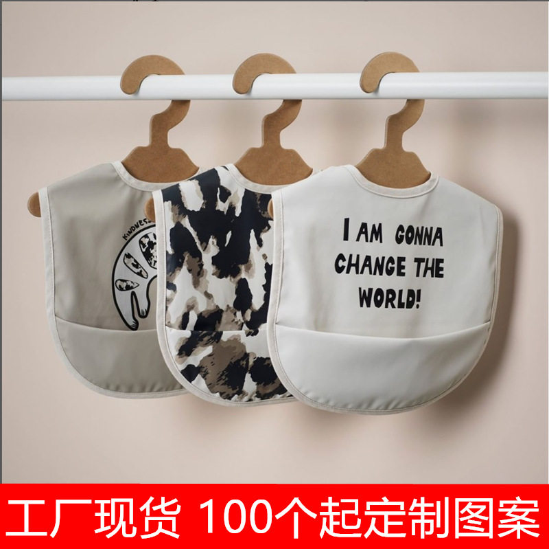 工厂婴儿童防水pu软塑料皮革围嘴宝宝饭兜围兜罩衣口水巾跨境