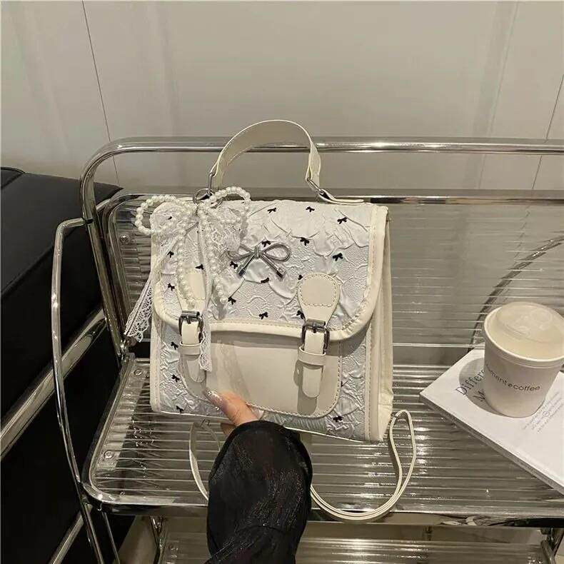 学院风蝴蝶结印花小揹包女夏季2026新款潮韩版洋派休闲旅行双肩包