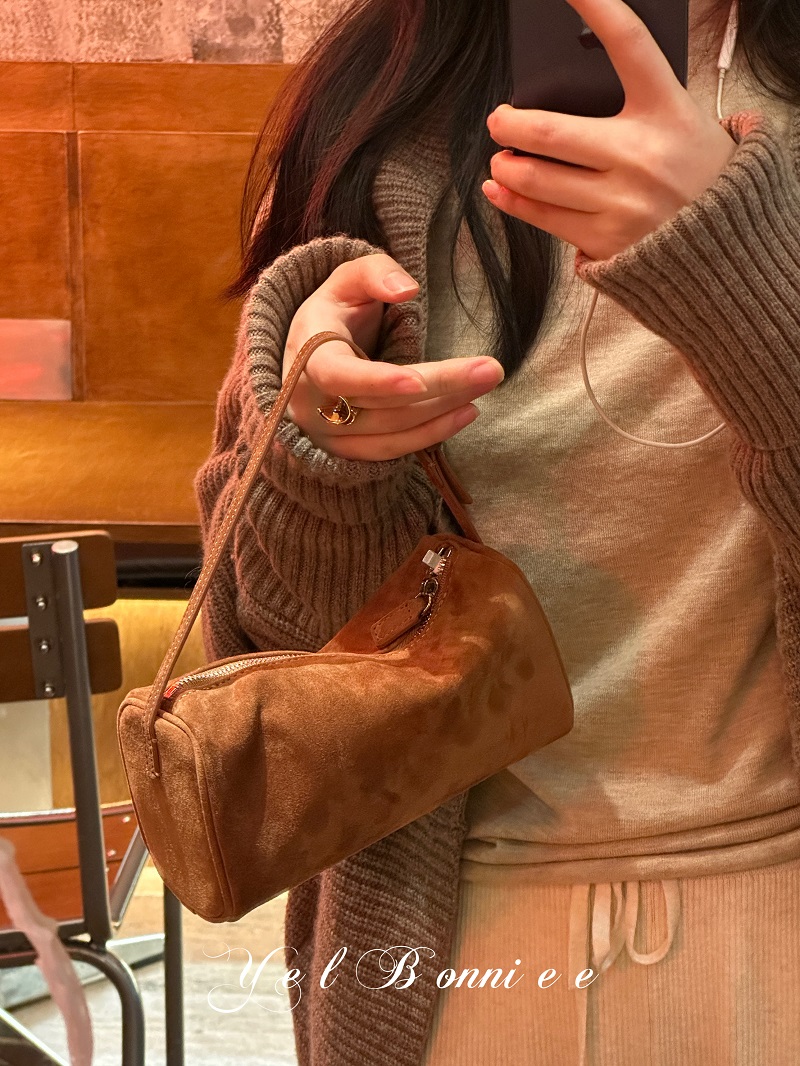 row羊猄绒真皮质感手拎包