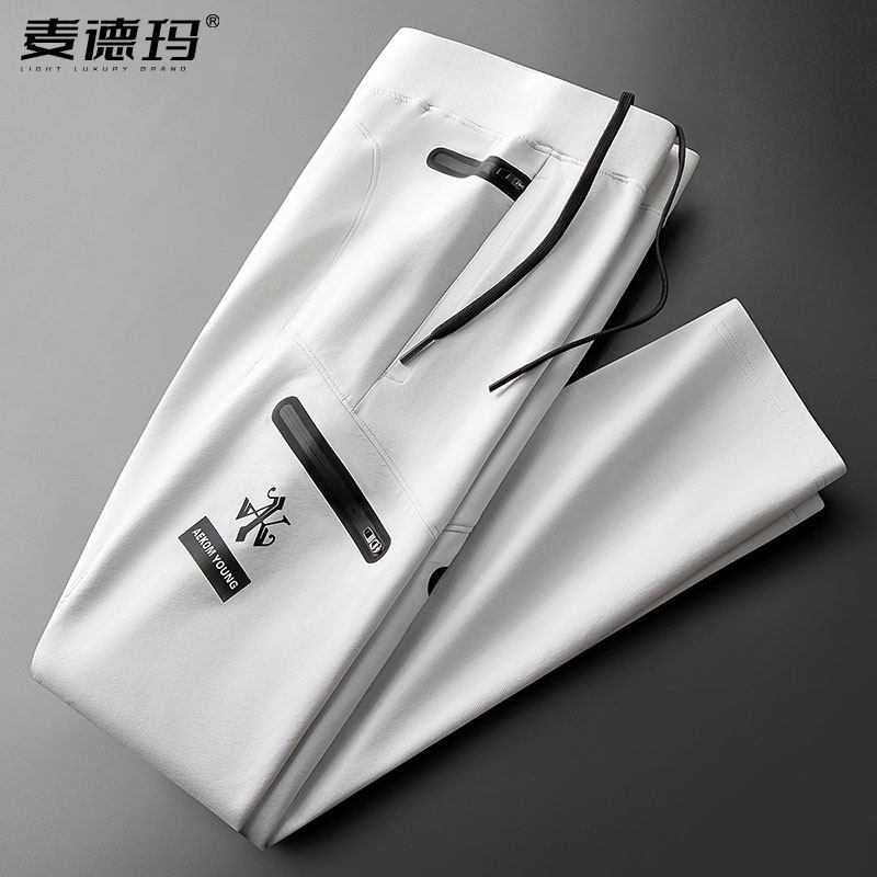 春夏时尚轻奢户外防风防水运动裤子软壳攀登冲锋裤男士修身休闲裤