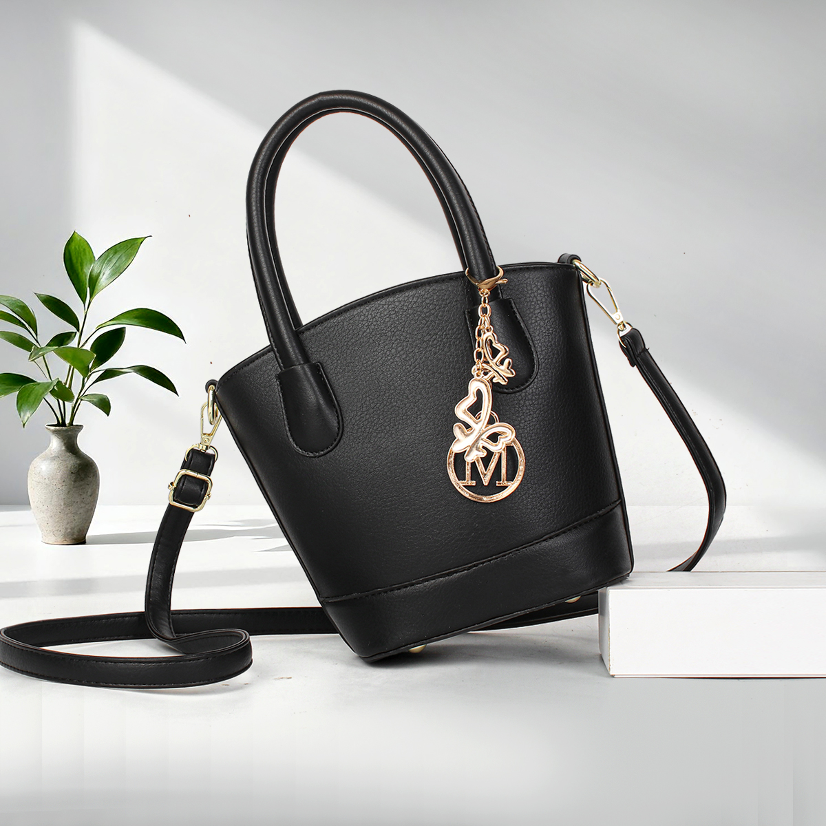 水桶包2025新款时尚百搭纯色复古通勤手提包气质单肩斜挎包女