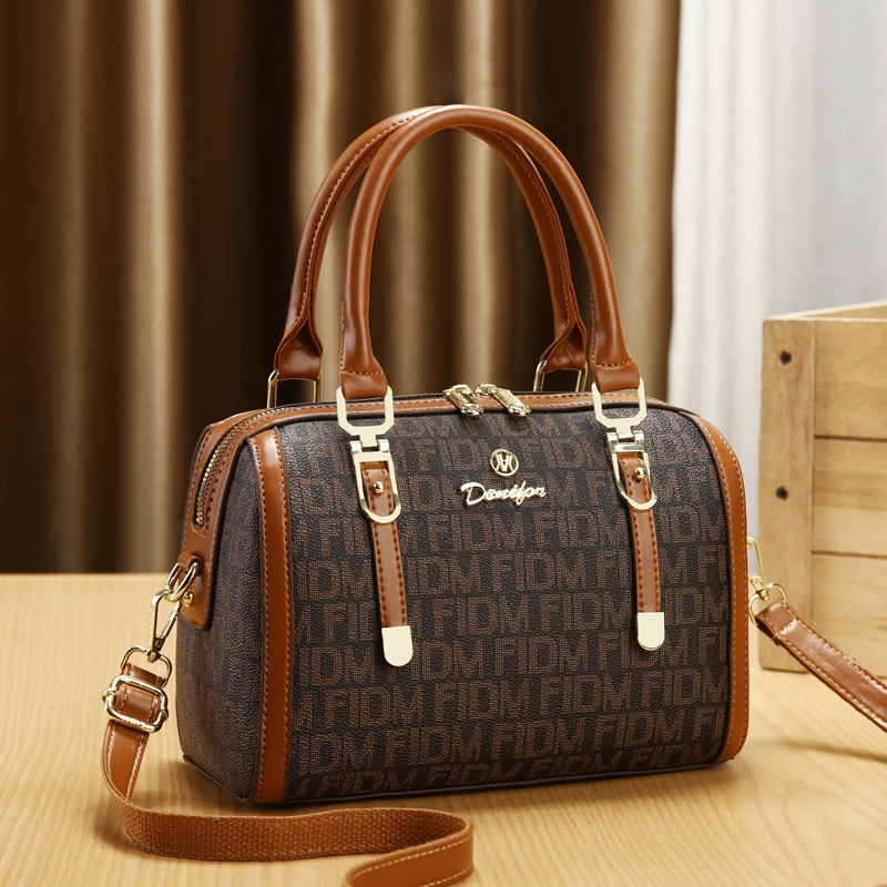 包包女2025新款时尚百搭撞色印花高级感枕头包气质单肩斜挎包女