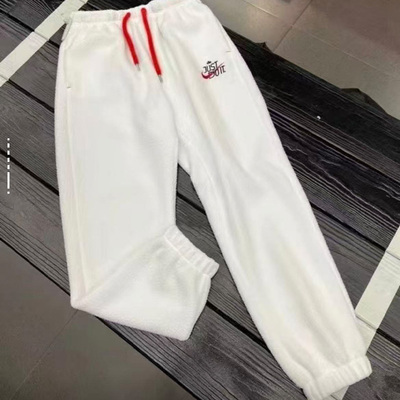 Nike 新年款纯色Logo标识抽绳系带束脚加绒针织运动裤 女款 BCL仓