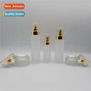round cosmetic set of glass bottles pressure pump water milk