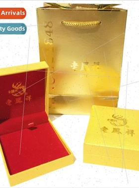 a Fengxiang bracelet packaging box gold color handbag engrav