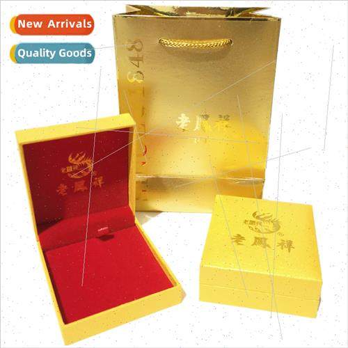 a Fengxiang bracelet packaging box gold color handbag engrav