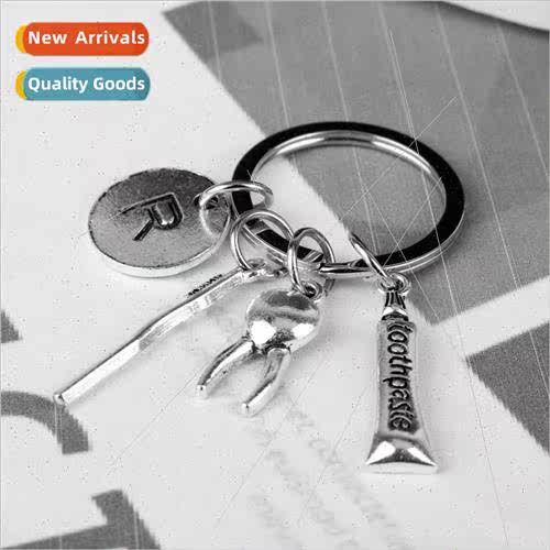 Creative metal toothpaste toothbrush teeth keychain personal