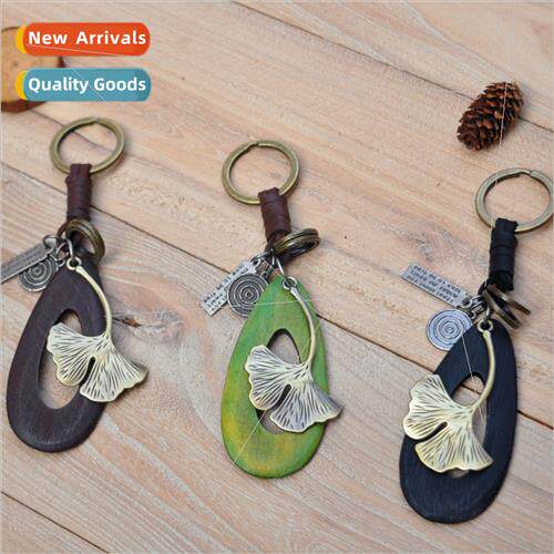mple creative hand-woven cowhide rope key chain leaf pendant