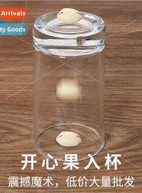 Pistachio into cup u Qian stage close-up magic props pistach