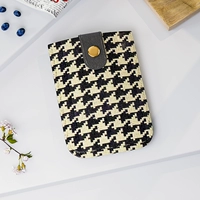 Черно -белый томбоа