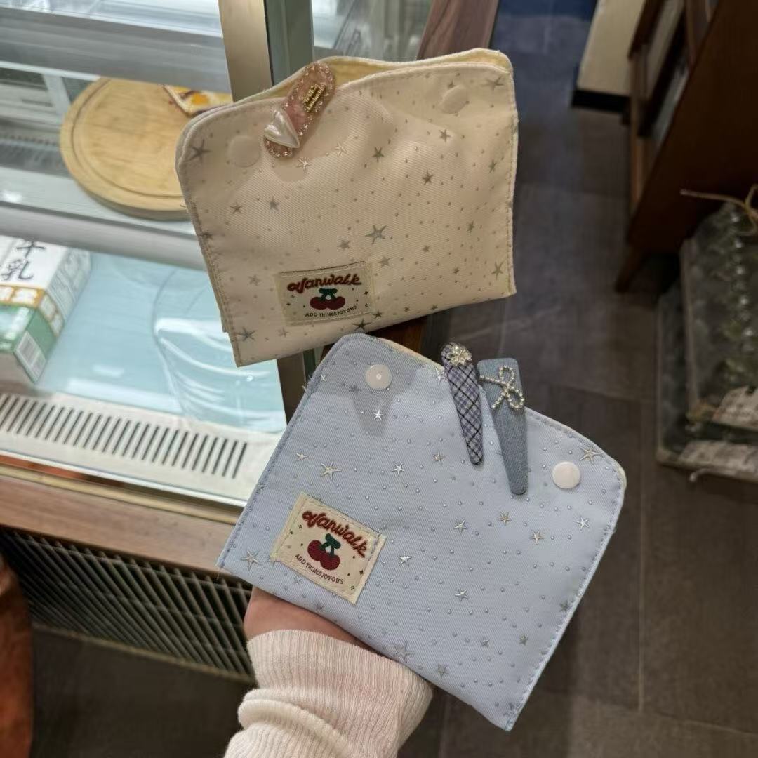 高颜值卫生巾收纳包手腕小化妆包图片