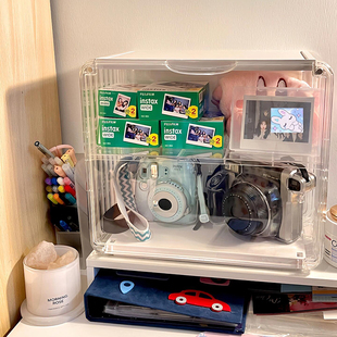 拍立得收纳盒ccd相机电池镜头胶片配件相纸富士佳能索尼透明柜箱