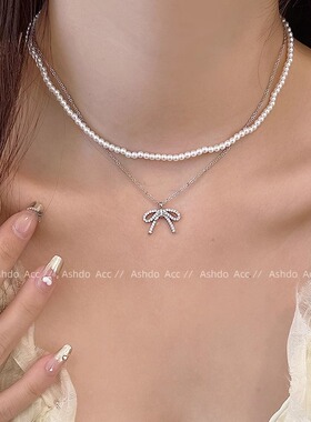 双层叠戴珍珠蝴蝶结项链女款2024新款轻奢小众锁骨链甜酷配饰颈链