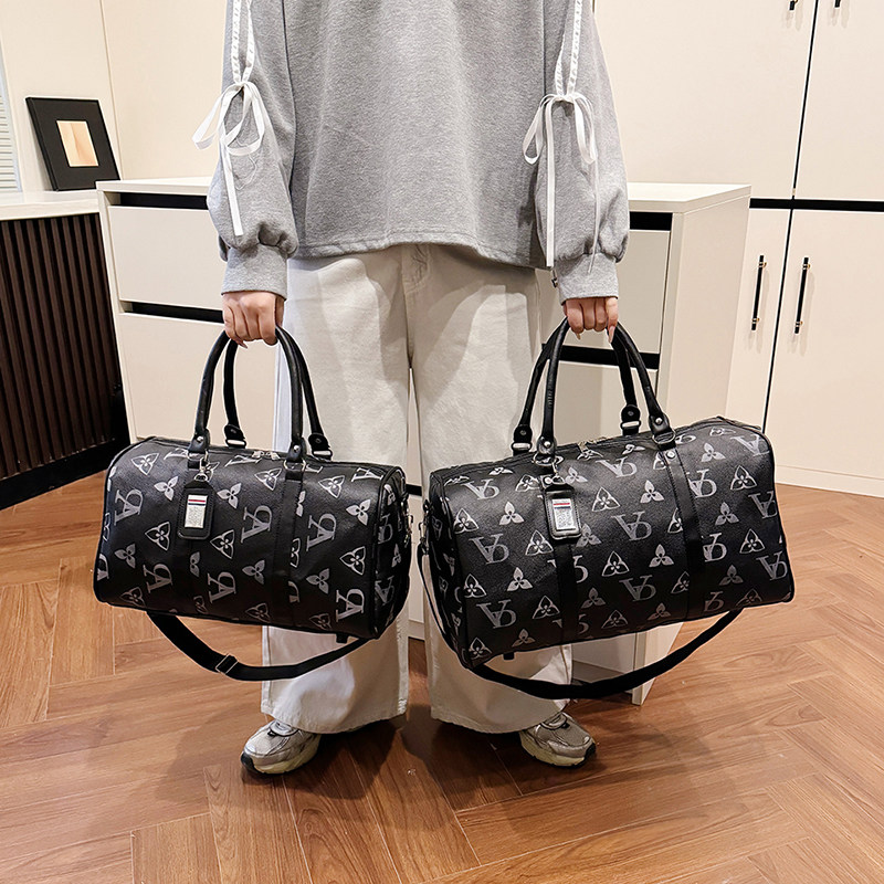 新款手提防水旅行包长短途大容量旅游登机包商务出差男女款健身包