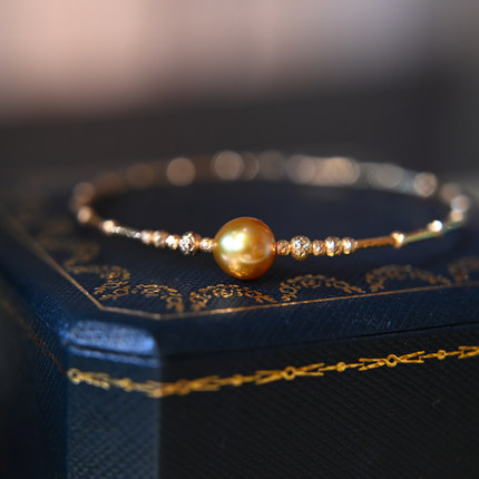 通体18K真金手镯天然正圆正金色7-8mm南洋金珍珠稀有熊猫点位大小