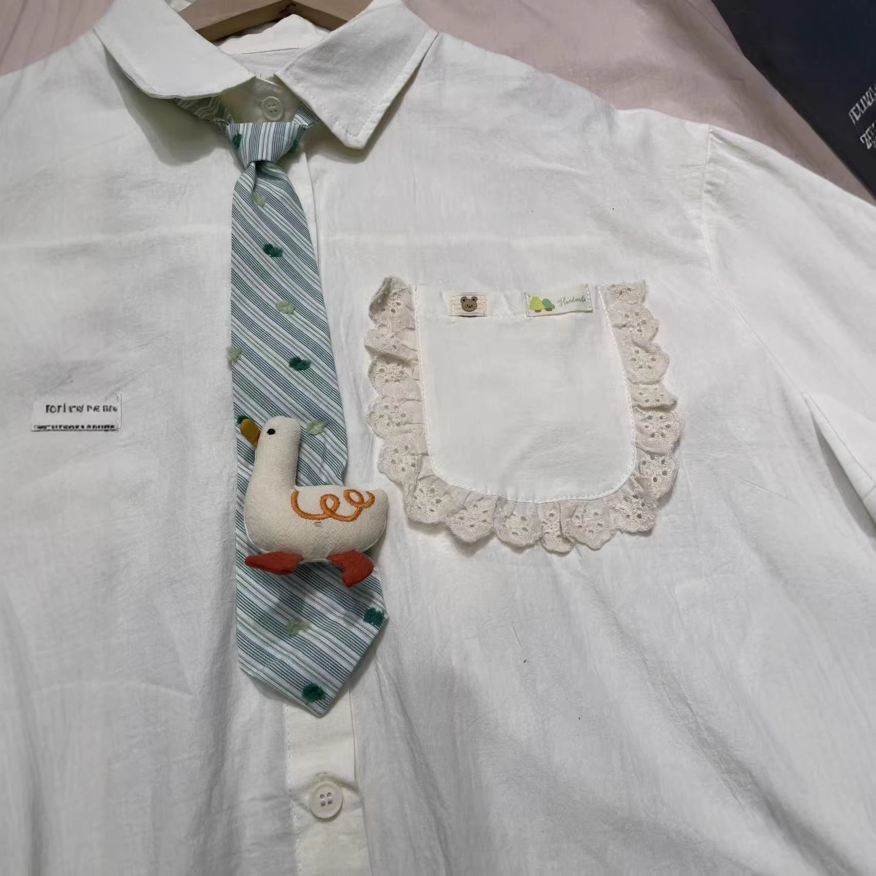夏季新款日系学院风领带短袖衬衫女 蕾丝口袋宽松减龄清新绿衬衣