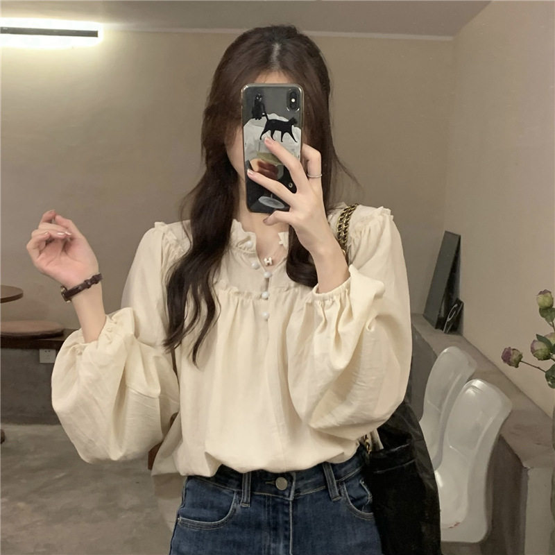 法式复古小众设计感上衣女春秋2026新款泡泡袖chic木耳边长袖衬衫