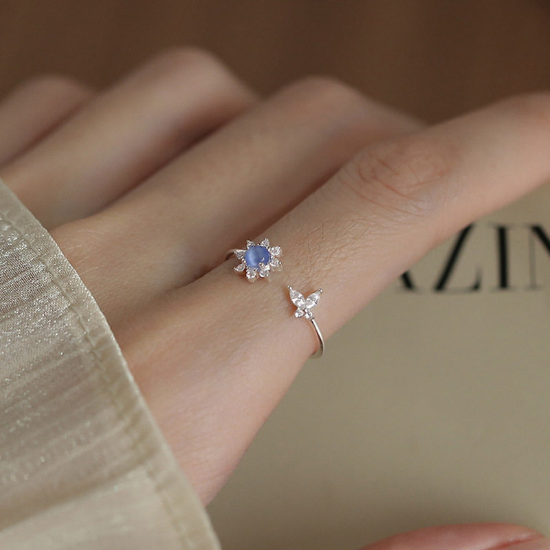 蓝色猫眼石太阳花戒指甜美奶油气质女轻奢锆石蝴蝶花朵指环关节戒