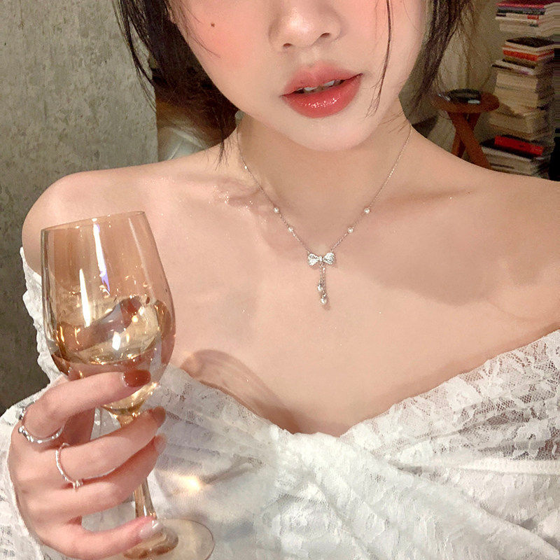 日韩风蝴蝶结珍珠流苏吊坠项链女小众设计感时尚简约锁骨链配饰品