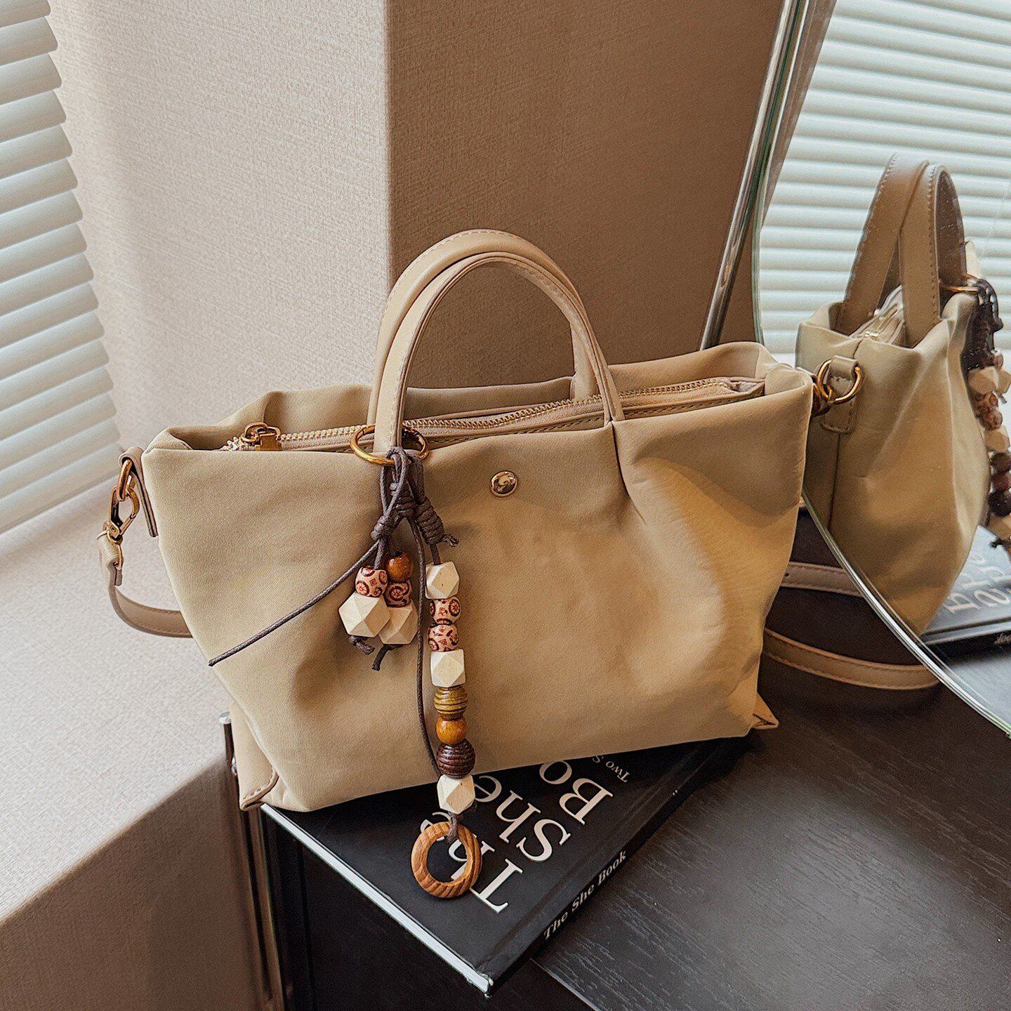 手提包出门上班杂物小拎包2026新款尼龙饺子包日常通勤百节日礼品