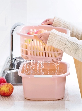 In the kitchen, a double-story dishwasher basket leaks a pla