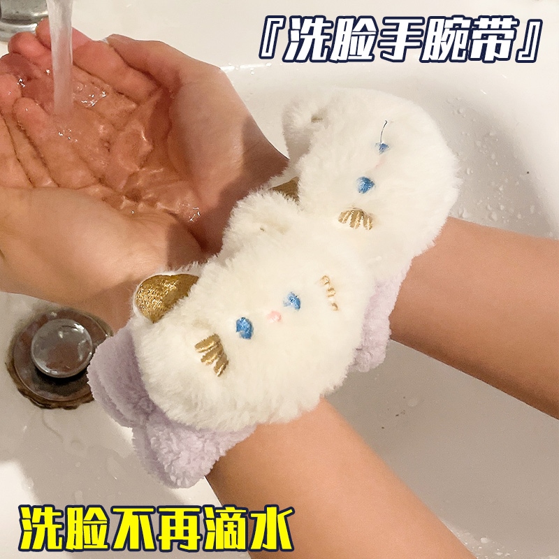 Home cat washes her wrists and kids wash their hands wet-sle