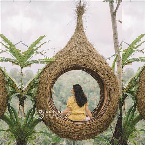 巴厘岛网红藤编鸟巢户外秋千景区婚纱拍摄道具创意悬挂圆形床民宿