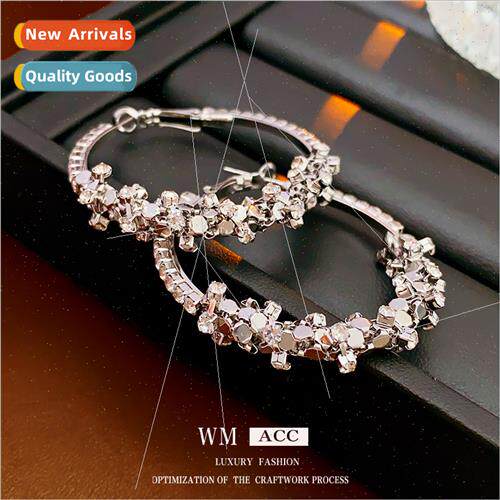 lver needle wh diamond sequins winding round earrings Europe